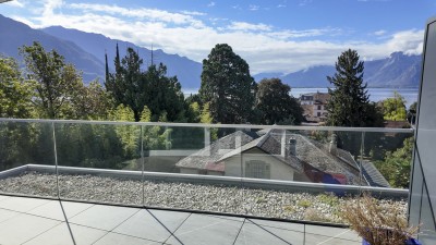 Magnifique attique avec grande terrasse et vue sur le lac