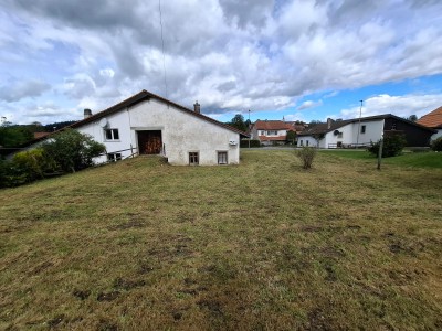 VENDU ! Maison mitoyenne avec grand potentiel